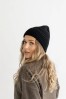 knoto. merino vilnos moteriška juoda kepurė